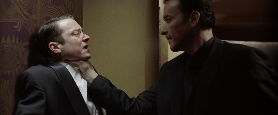 John Cusack i Elijah Wood w filmie "Wirtuoz"